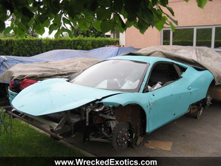 Illustration for article titled Wrecked Ferrari 458 Italias Hide Shame Under Tarps